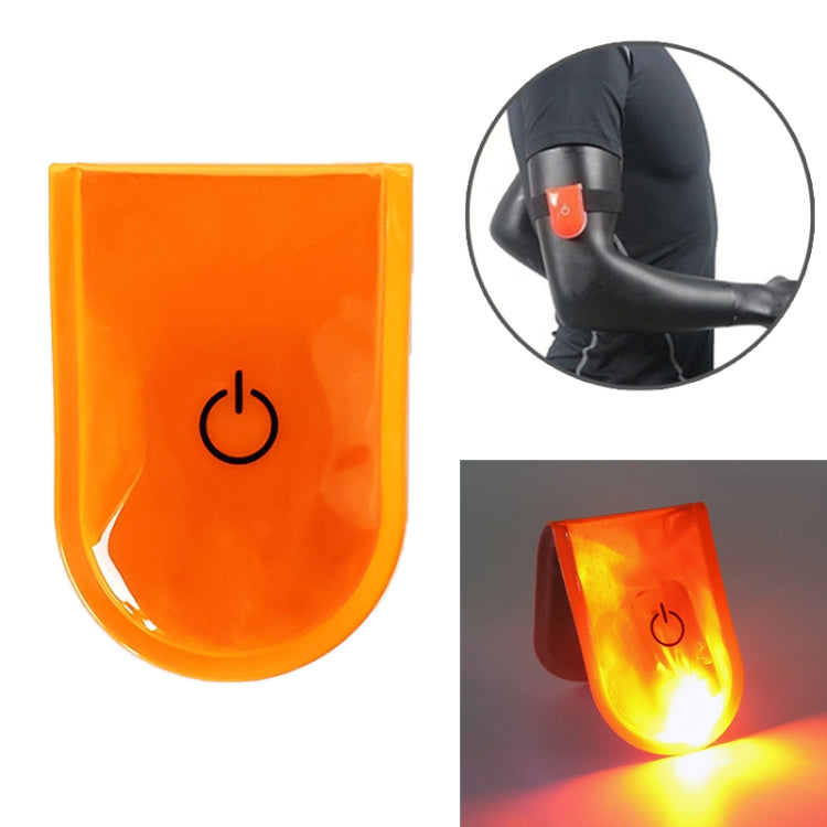 LED magnet clip safety light, orange translucent body with glowing LED