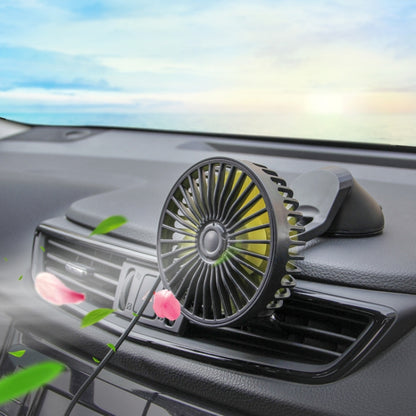 Portable car console fan with suction base and black vent grille