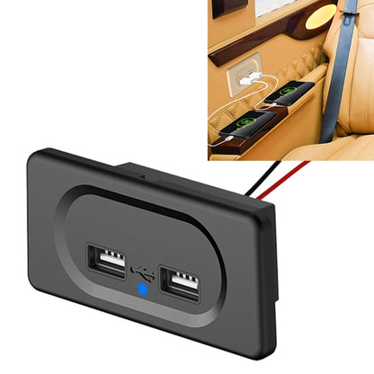 Dual USB car charger module in black housing with blue indicator light