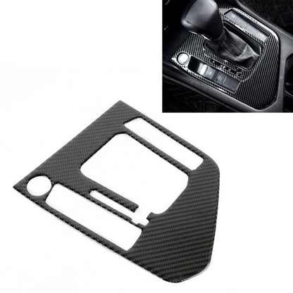 Carbon fiber gear shift panel trim sticker with cutout windows, dark textured finish