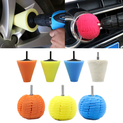 Yellow foam car polishing pad disc on a mounting rod for wheel polishing.