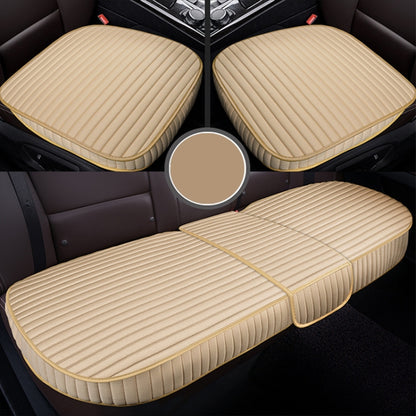 Beige car seat cushion set with quilted striped seat pads and edge piping