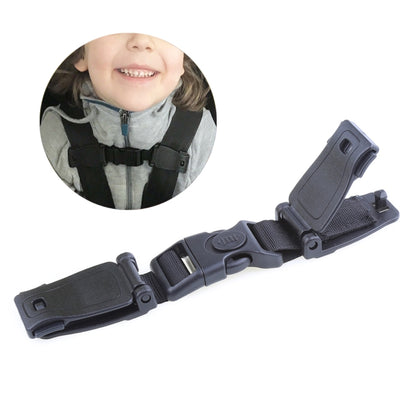 Kids car seat belt adjuster with dark buckle on child safety harness strap