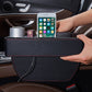 Black PU leather car console holding a smartphone in the cup holder area