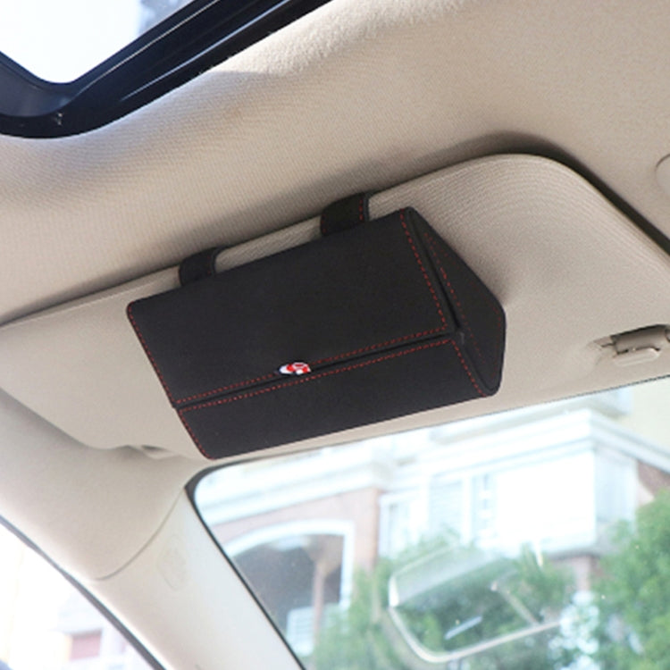 Black glasses storage bag with red-stitched flap mounted in car