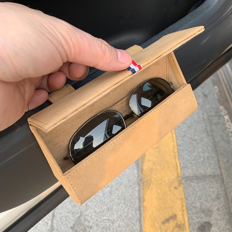 Beige glasses storage bag open with eyeglasses inside