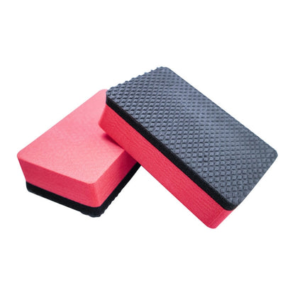 Car wash sponge cubes, red and dark gray rectangular scrub blocks.