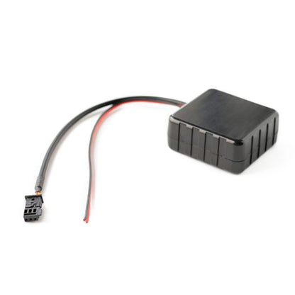 Car AUX Bluetooth audio wiring harness module with black casing and connector plug