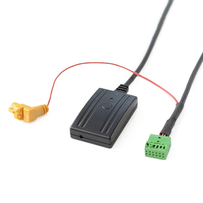 Multimedia audio cable interface module with black housing, yellow and green connectors