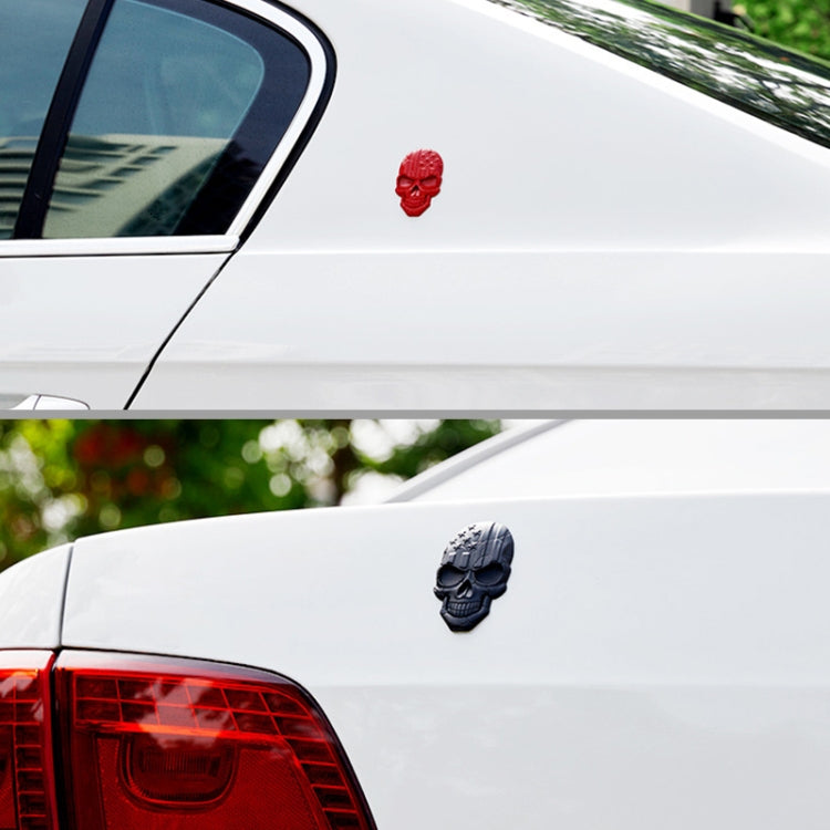 Red 3D devil skull car sticker on car body near the window