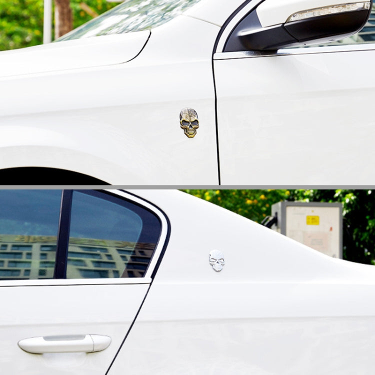 Gold 3D devil skull car sticker on a car door panel