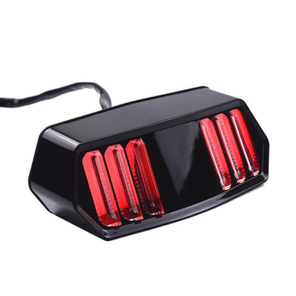 Motorcycle tail light brake lamp with black housing and red vertical LED bars