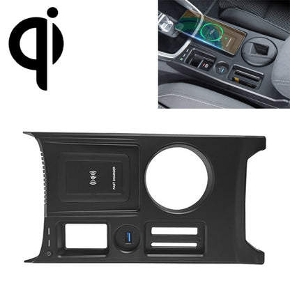 Black car Qi wireless charger module with circular pad, ports, and cooling vents