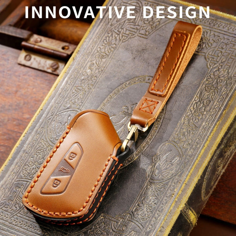 Brown cowhide leather key fob cover set with key ring strap and stitched emblem