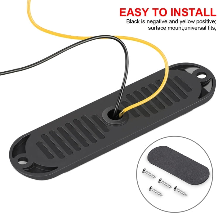 Side marker LED base with black housing, wire leads, and mounting screw holes