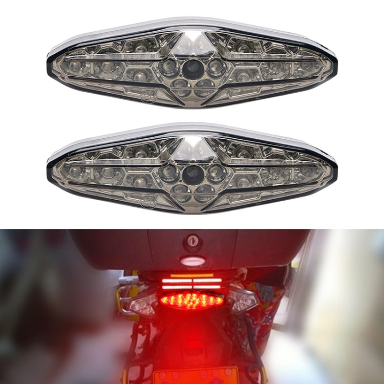 Motorcycle LED running light with clear lens and black housing, two-piece set shown top view