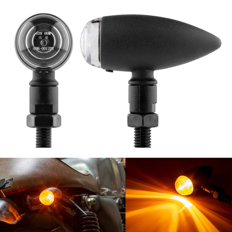 Motorcycle turn signal light with clear lens over amber bulb, black housing, threaded mount