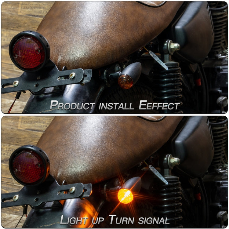Mounted motorcycle turn signal with red lens and metal bracket, light on and off