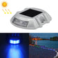 Solar horseshoe road stud light with blue LED glow and clear front lens