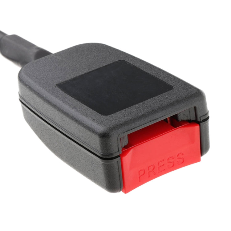 Black seat belt extension buckle with red release button and open latch cutout