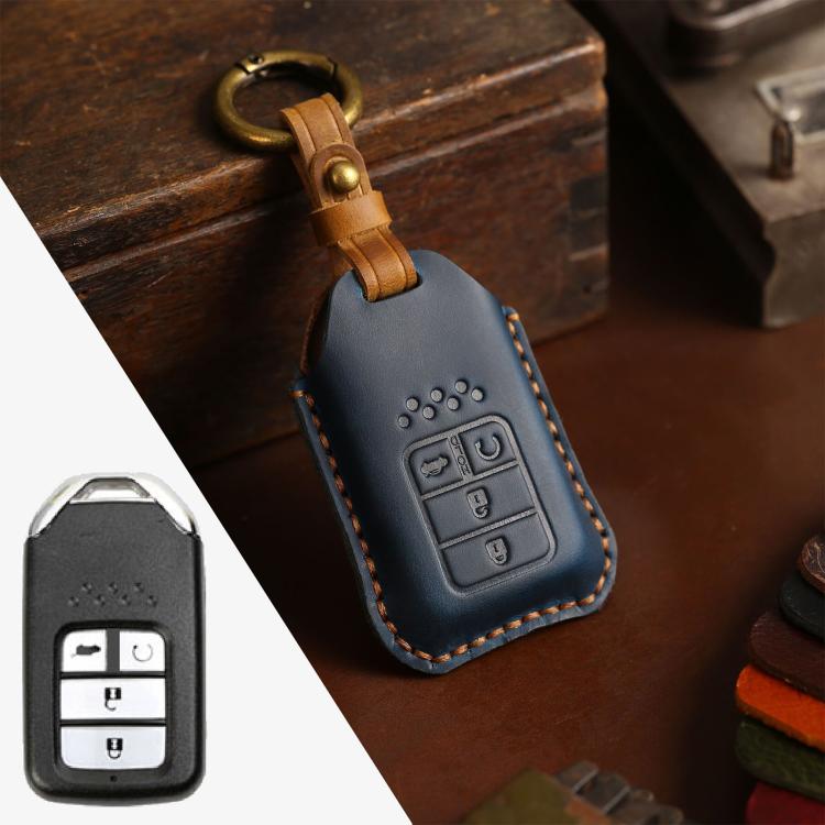 Blue cowhide leather key fob cover with key ring, embossed button icons, brown stitching