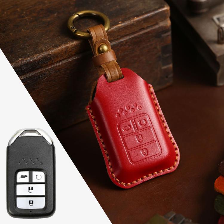 Red cowhide leather key fob cover with key ring and embossed button icons, brown stitching