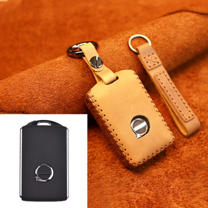 Brown leather single-slit key protective case with stitched edges and metal ring