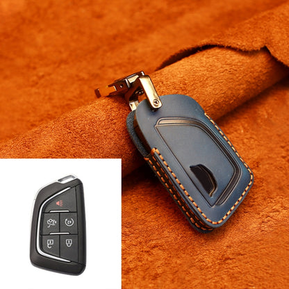 Blue cowhide leather key case with cutout for key fob buttons and stitched edge