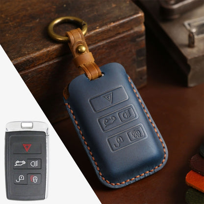 Blue leather key protective case with embossed button icons and stitched edges