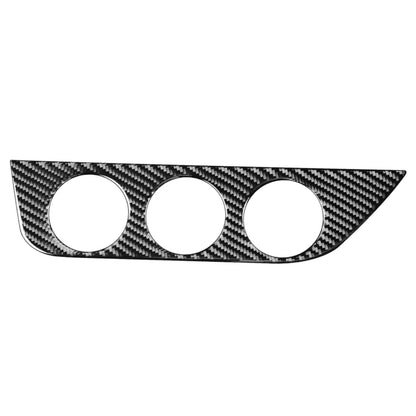 Carbon fiber-look A/C switch panel sticker with three circular cutouts