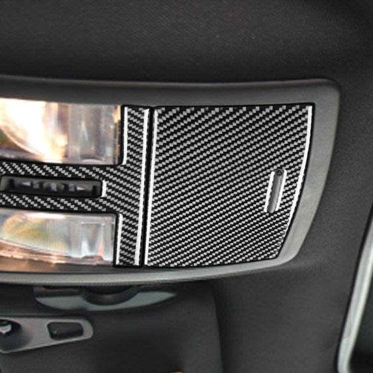 Installed carbon fiber reading light panel sticker on car interior trim near dome lights