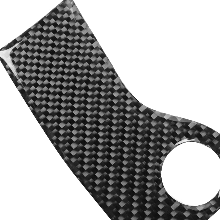 Angled carbon fiber headlight switch panel sticker with circular cutout and small slot