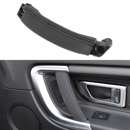 Black leather-texture inside door handle trim with mounting clip ends