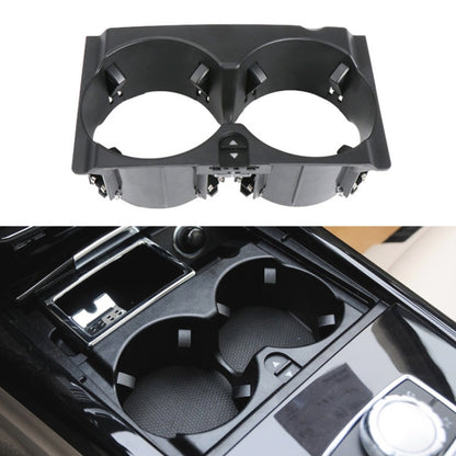 Car cup holder insert with two round openings, black frame and mounting clips