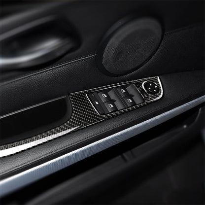 Carbon fiber car door switch panel trim sticker with cutout for control buttons