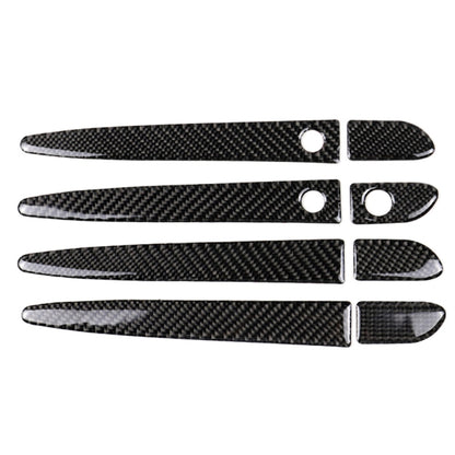 Carbon fiber patterned door handle trim sticker set with circular hole cutouts, black
