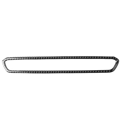 Carbon fiber-look CD button frame trim, black with woven pattern