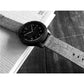 Canvas wrist strap with silver buckle, dark grey with perforation holes on watch