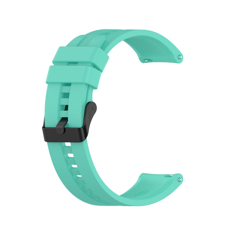 Mint green silicone watch strap with black buckle for a 42mm smartwatch