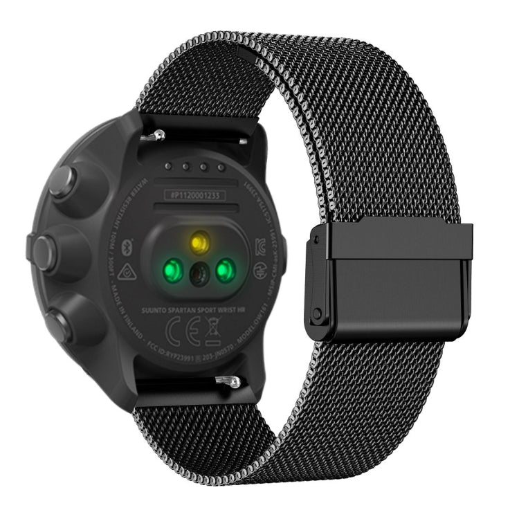 Black milanese mesh watch strap with clasp buckle, shown with dark smartwatch
