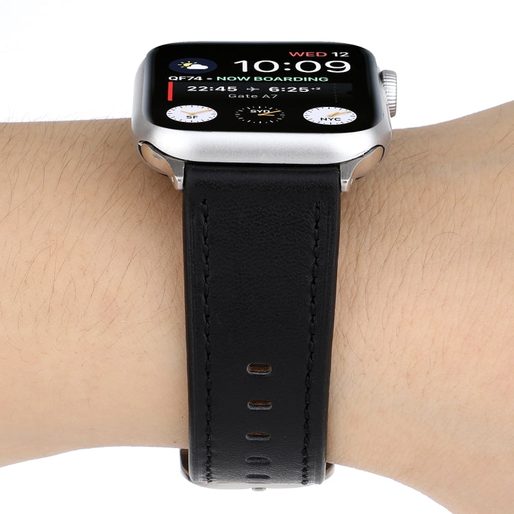 Genuine leather buckle watch strap for Apple Watch with black band and stitched holes.