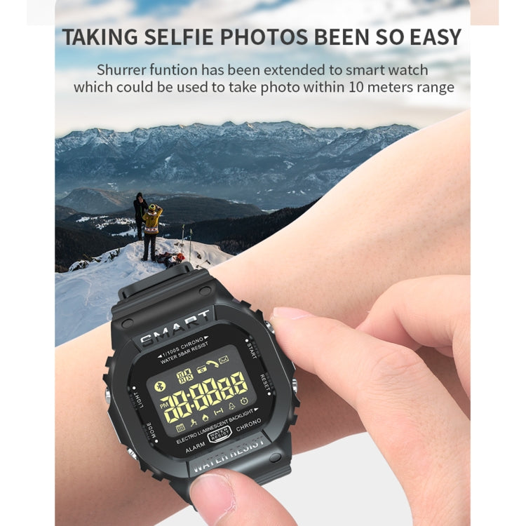 Black smartwatch on wrist with camera-ready selfie display