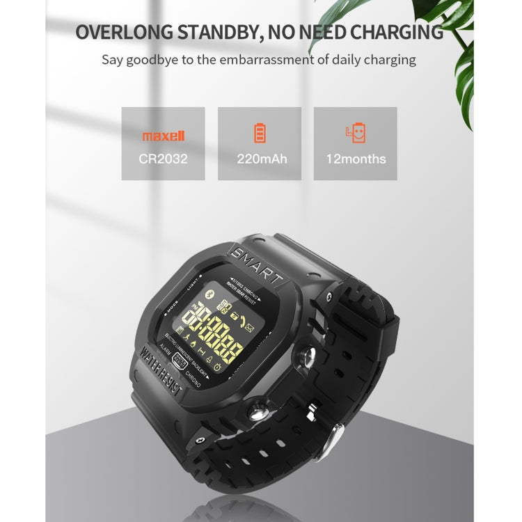 Black smartwatch with yellow FSTN LCD screen on wristband, front view