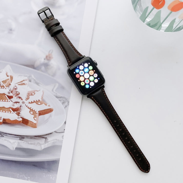 Black leather watch band with metal buckle, double-sided replacement strap for Apple Watch.