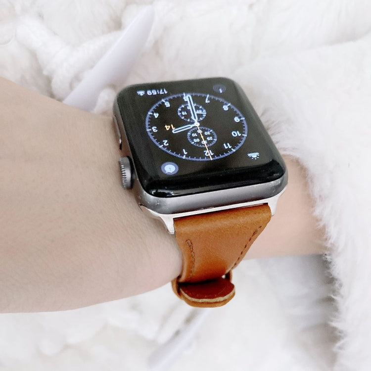 Brown leather watch band with metal buckle, double-sided replacement strap for Apple Watch.
