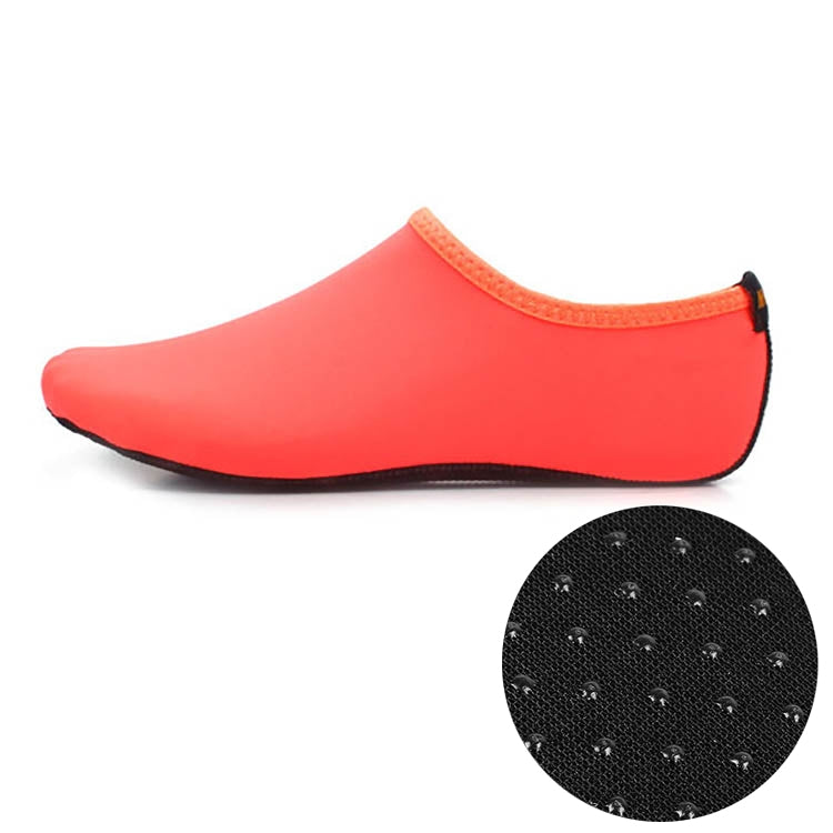 Coral orange slip-on water diving shoe with thick non-slip textured sole