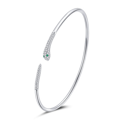 Sterling silver open snake bracelet with pave head and green eyes