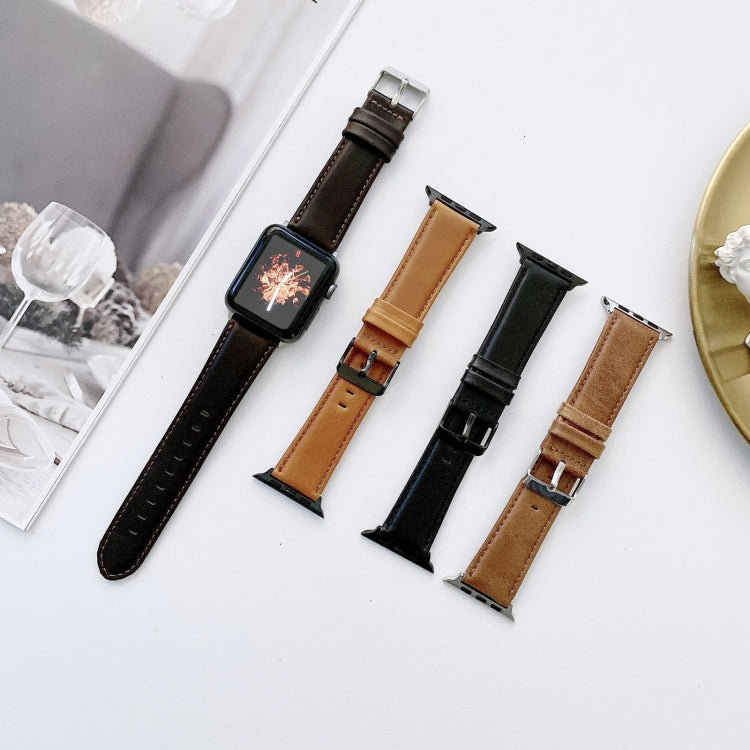 Set of leather watch bands with metal buckles in black, tan, and dark brown