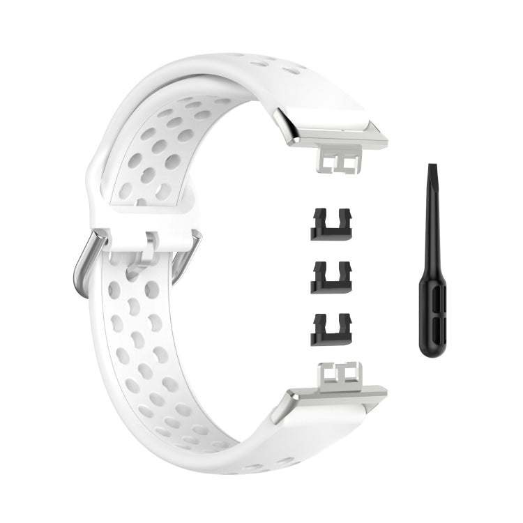 White perforated silicone watch strap with clasp, replacement adapters, and pin tool.