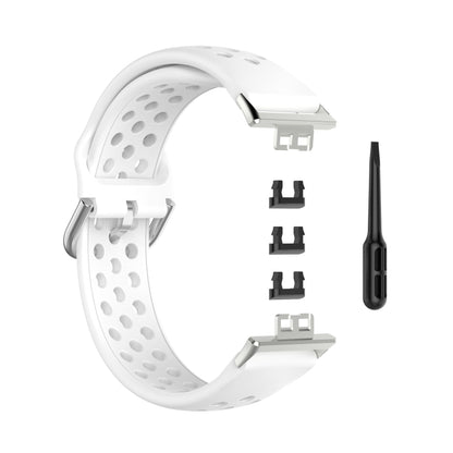 White perforated silicone watch strap with clasp, replacement adapters, and pin tool.